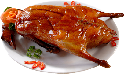 Roast goose with tangerine peel on a white platter